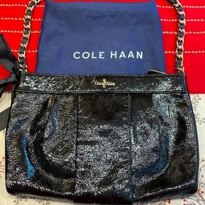 Cole Haan black patent small shoulder bag.